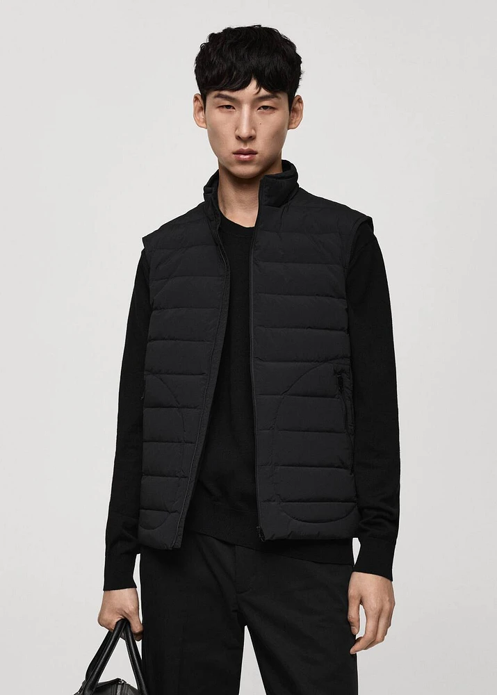 Quilted vest with feather filling