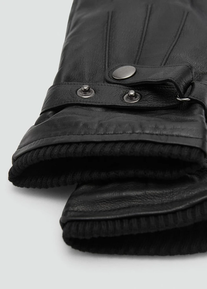 100% leather gloves with adjustable strap and buttons