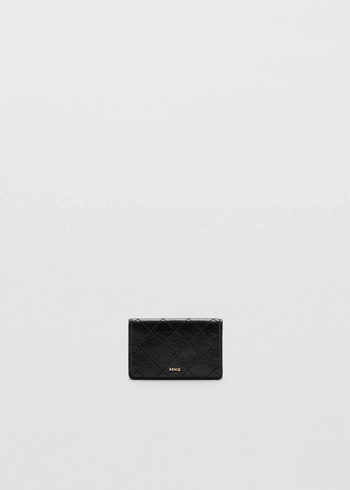 Coin purse with flap and decorative stitching