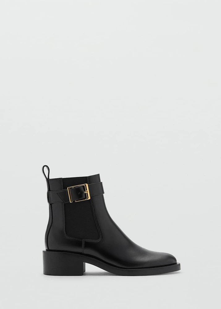 Ankle boots with elastic panel and buckle