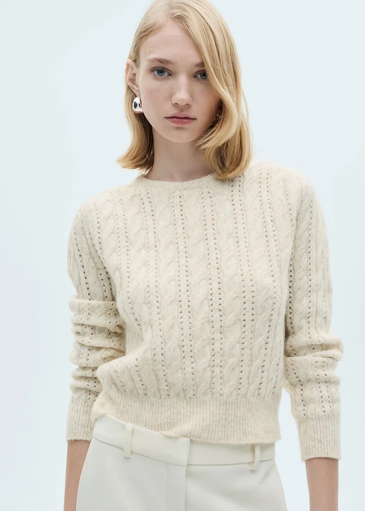 Braided sweater with openwork details