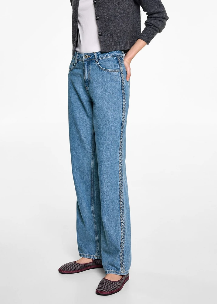 Jeans with braided sides