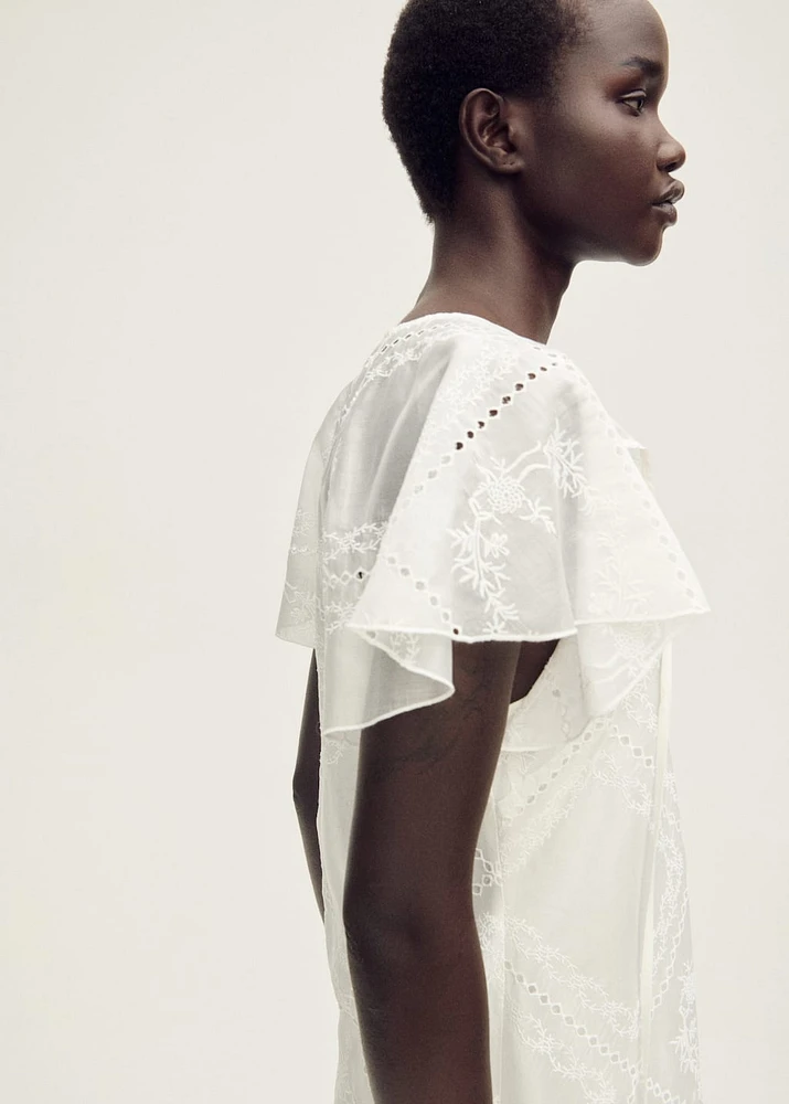 Embroidered dress with openwork details