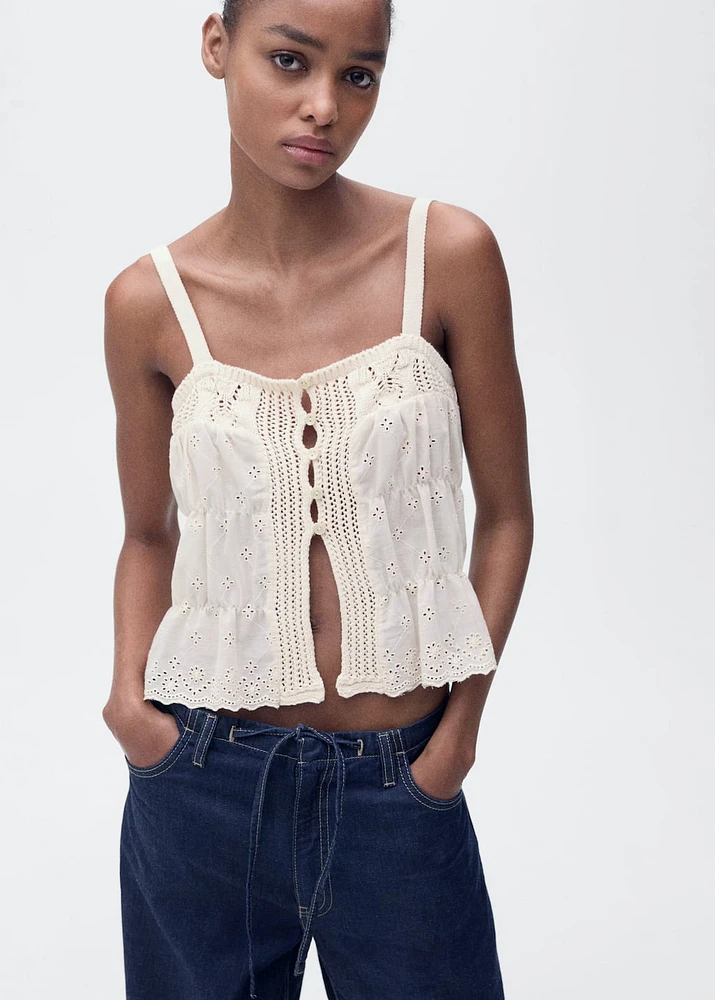 Combined top with openwork details
