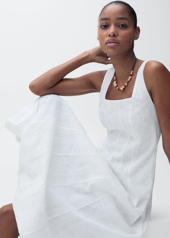 Embroidered dress with puffed hem