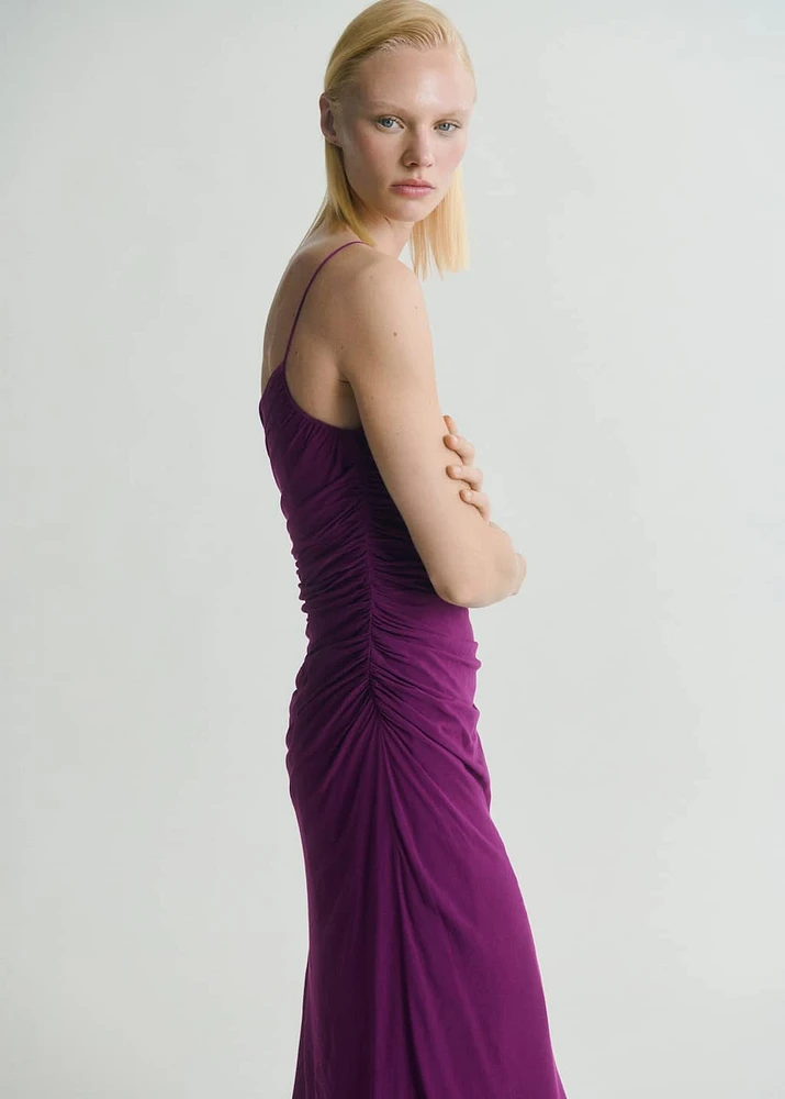 Asymmetrical dress with gathered sides