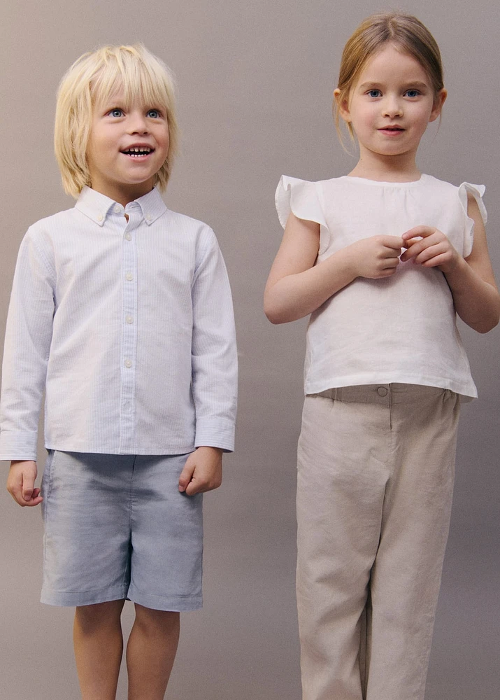 Linen-blend ruffled blouse