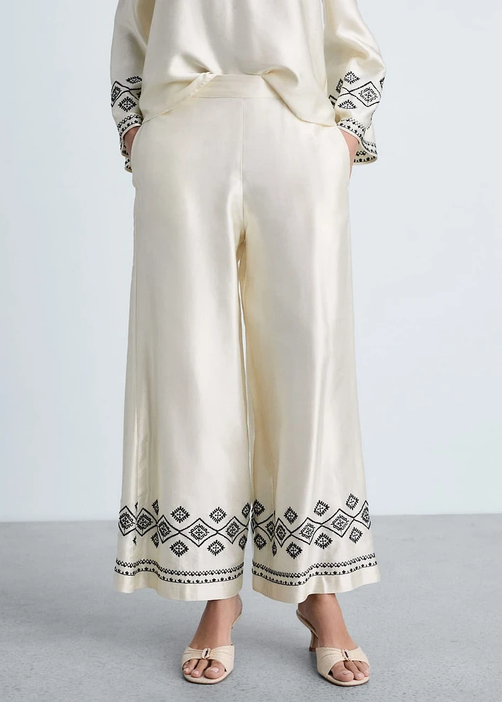 Wide leg pants with embroidered hem