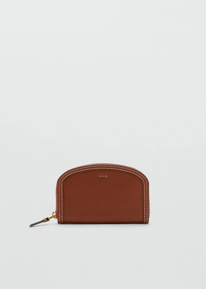 Oval leather-effect wallet