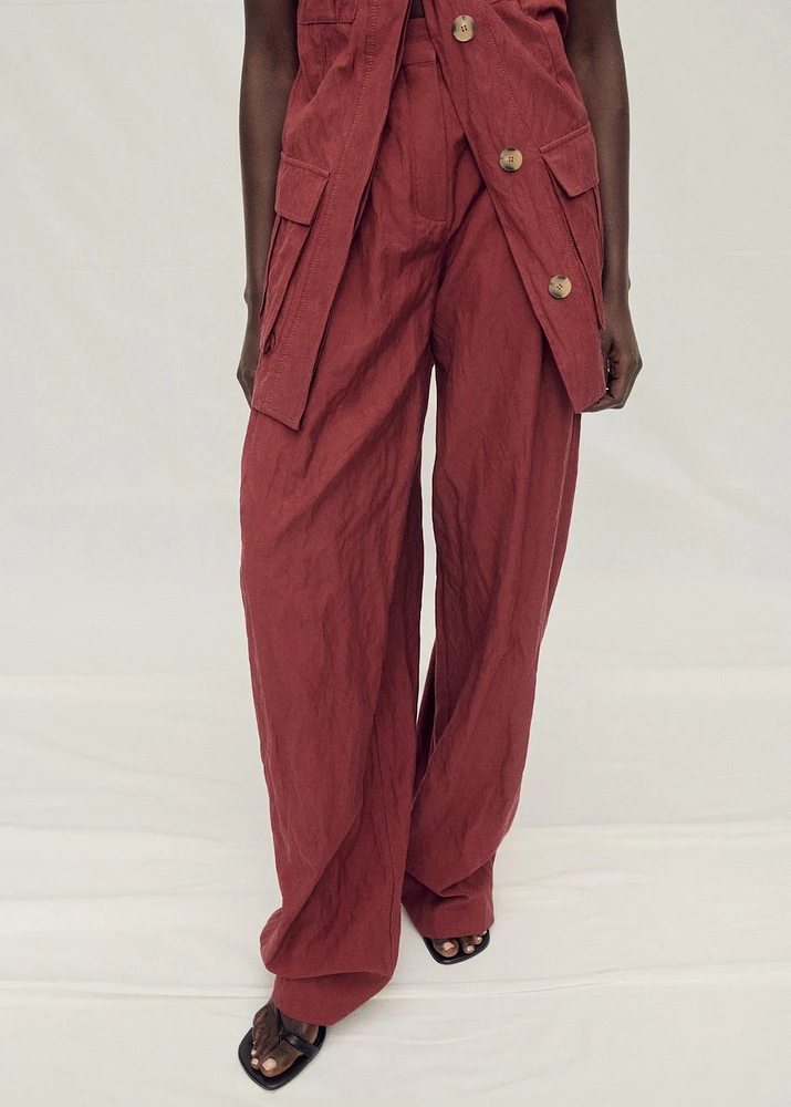 Wide leg suit pants with a creased effect