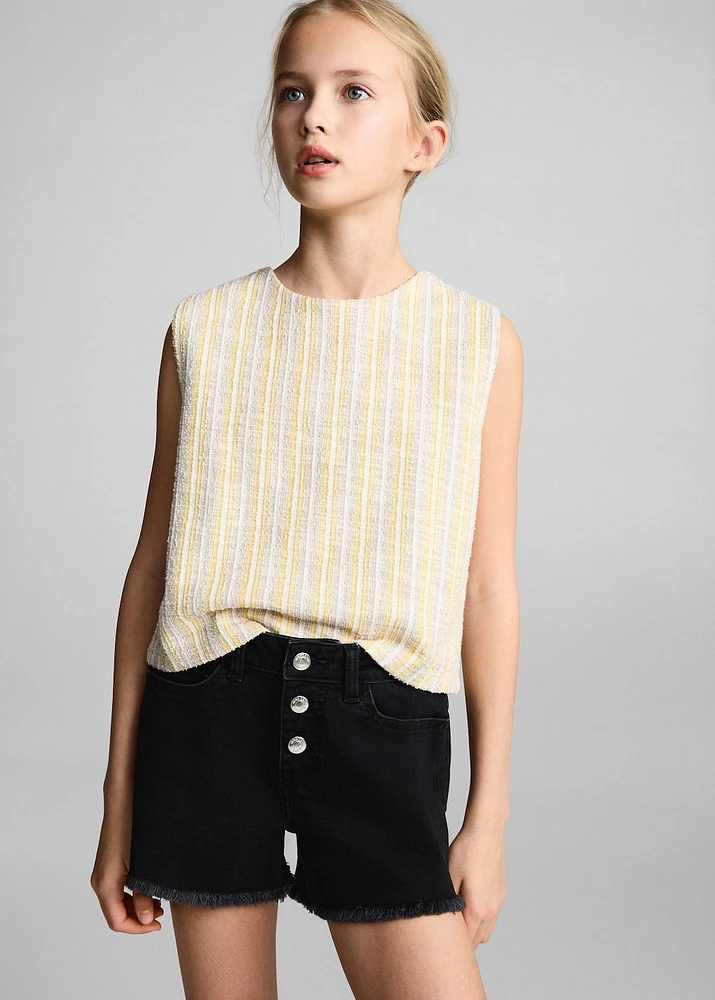 Denim shorts with frayed hem