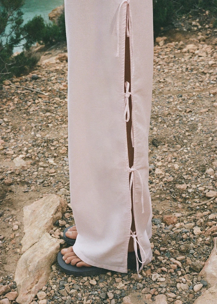 Straight pants with slits and bows