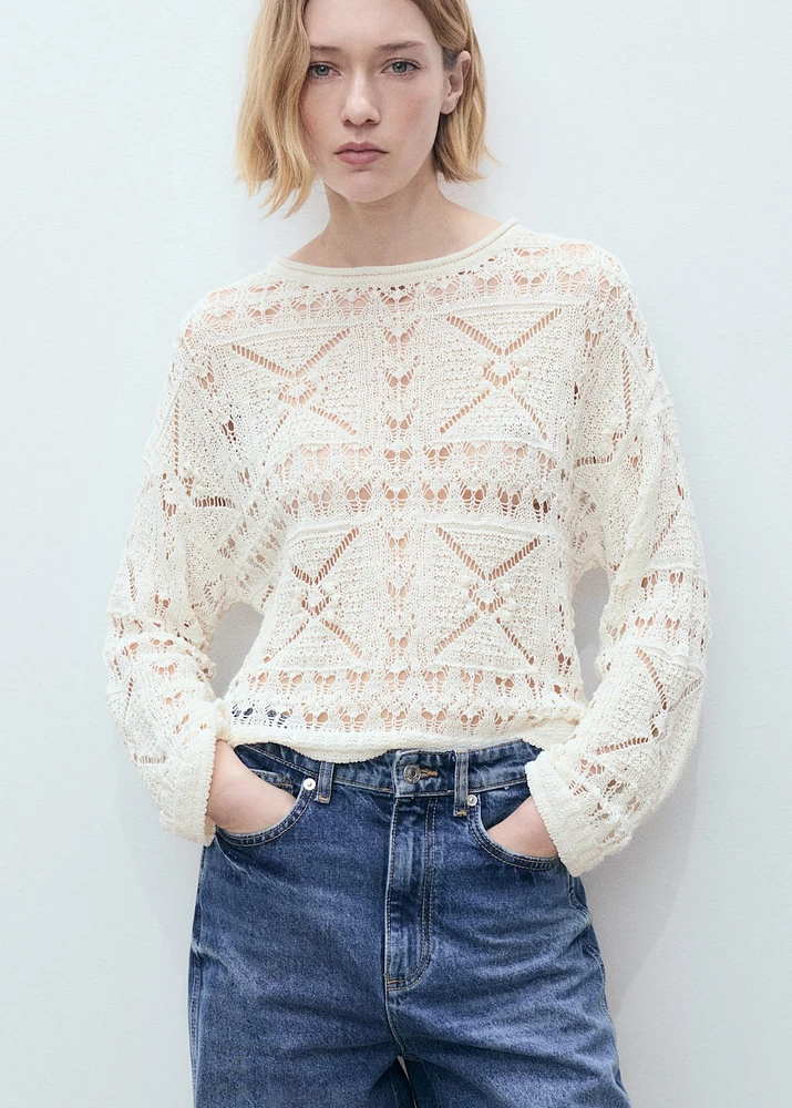 Oversized openwork knitted sweater