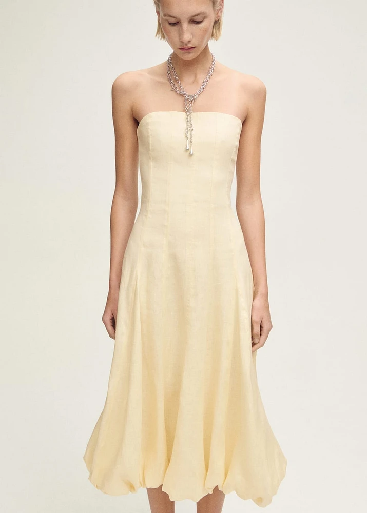 Linen dress with puffed hem