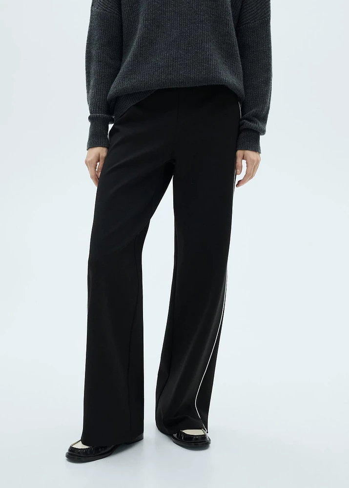 Knitted pants with contrasting stripes