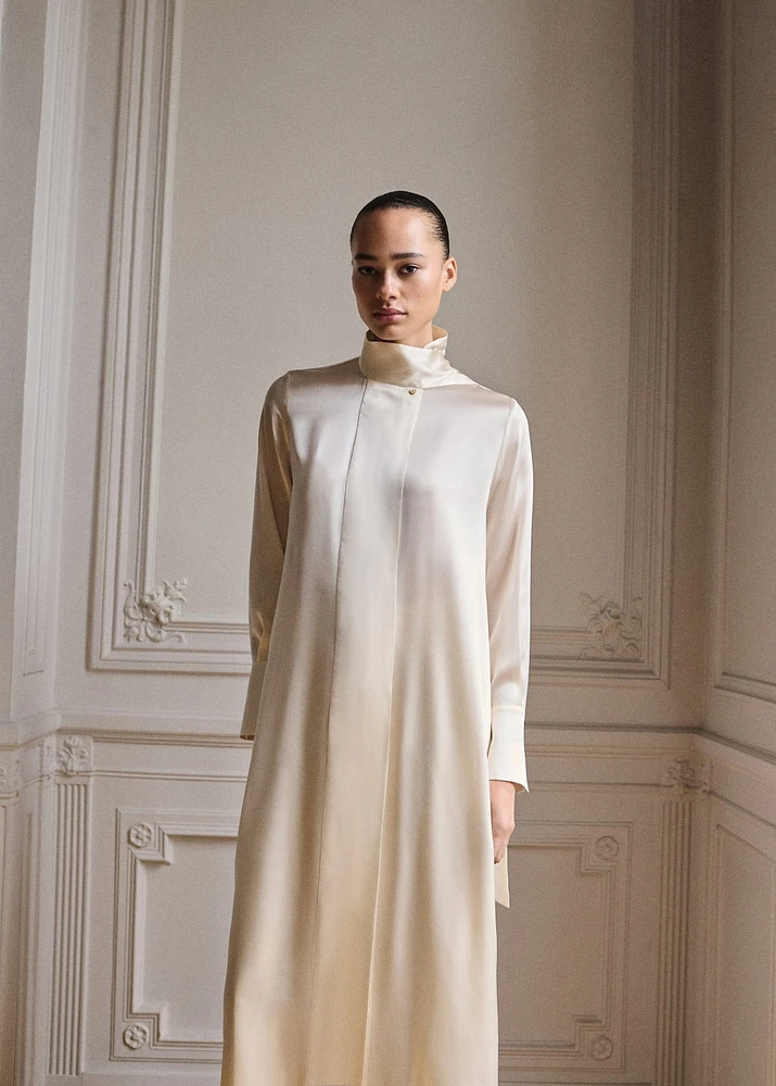Cape-style silk dress with bow neck