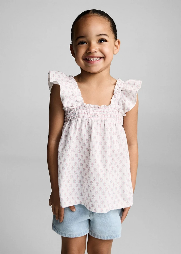 Ruffled embroidered blouse