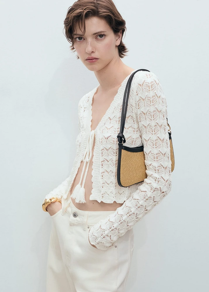 Crochet cardigan with bow closure