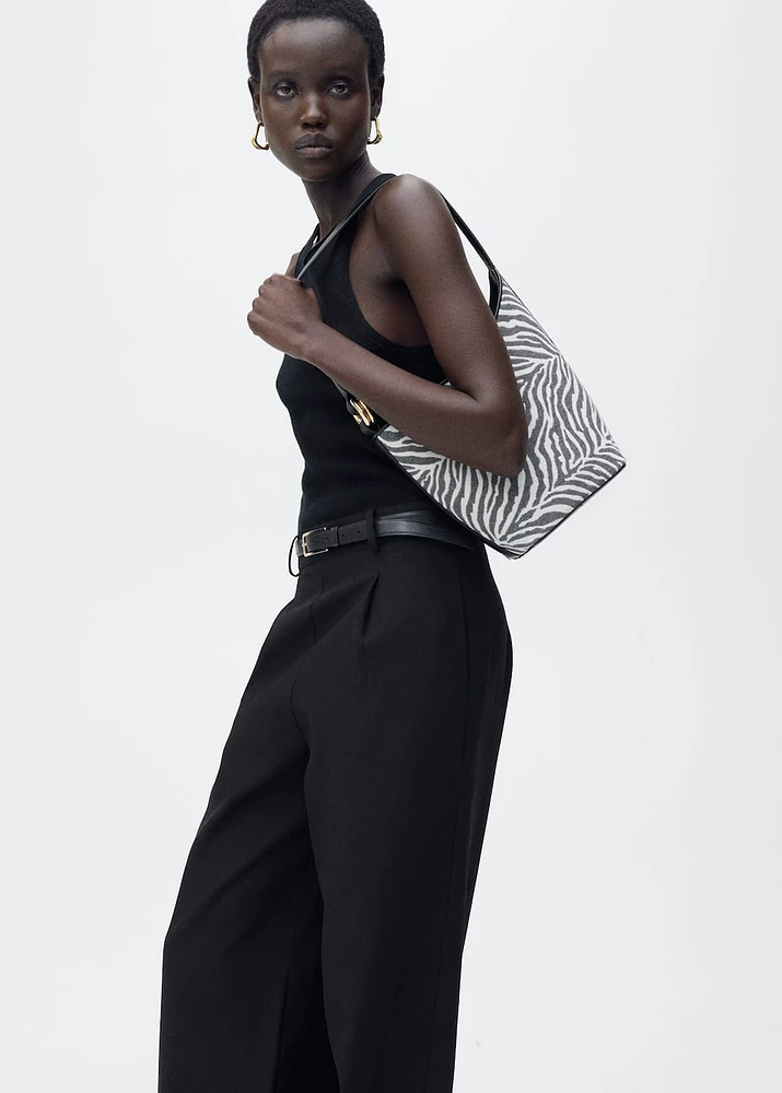 Combined-fabric jumpsuit with belt