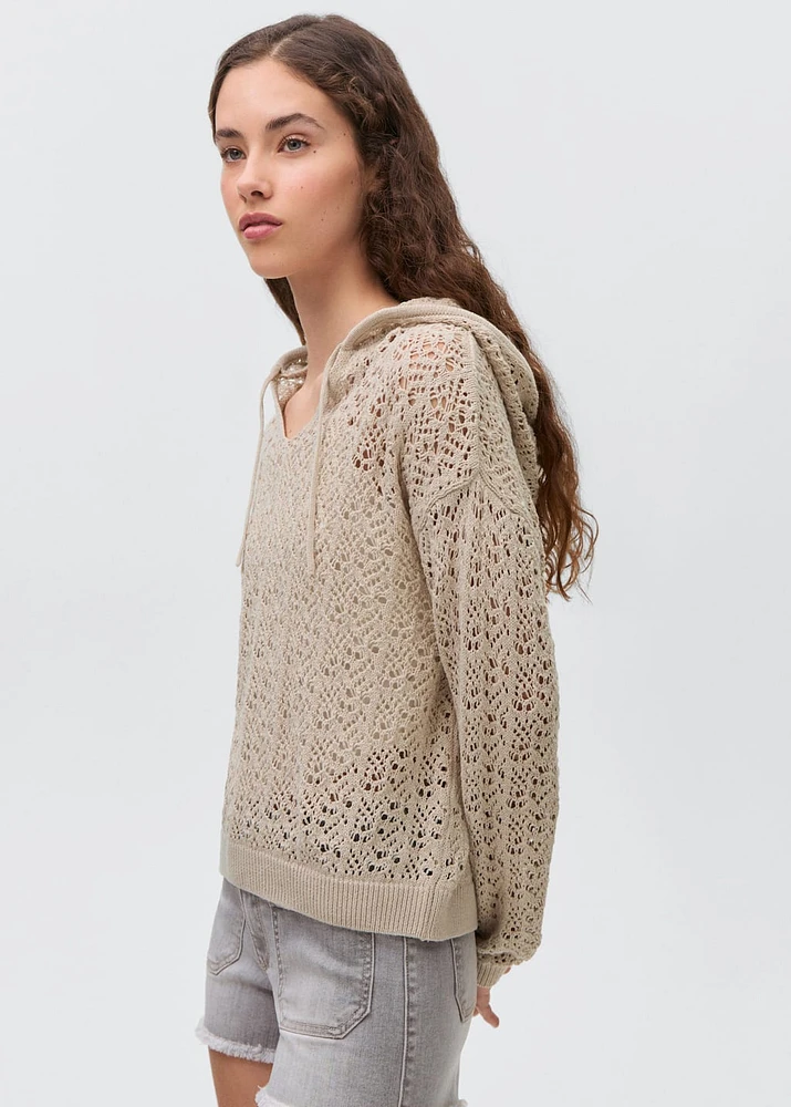 Openwork knitted sweater with hood