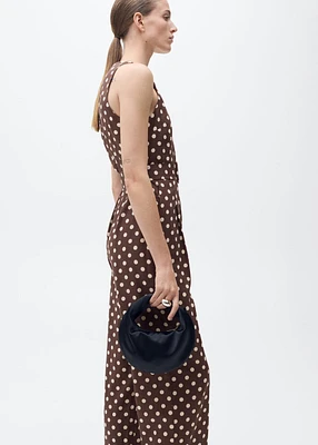 Linen jumpsuit with polka-dots and belt