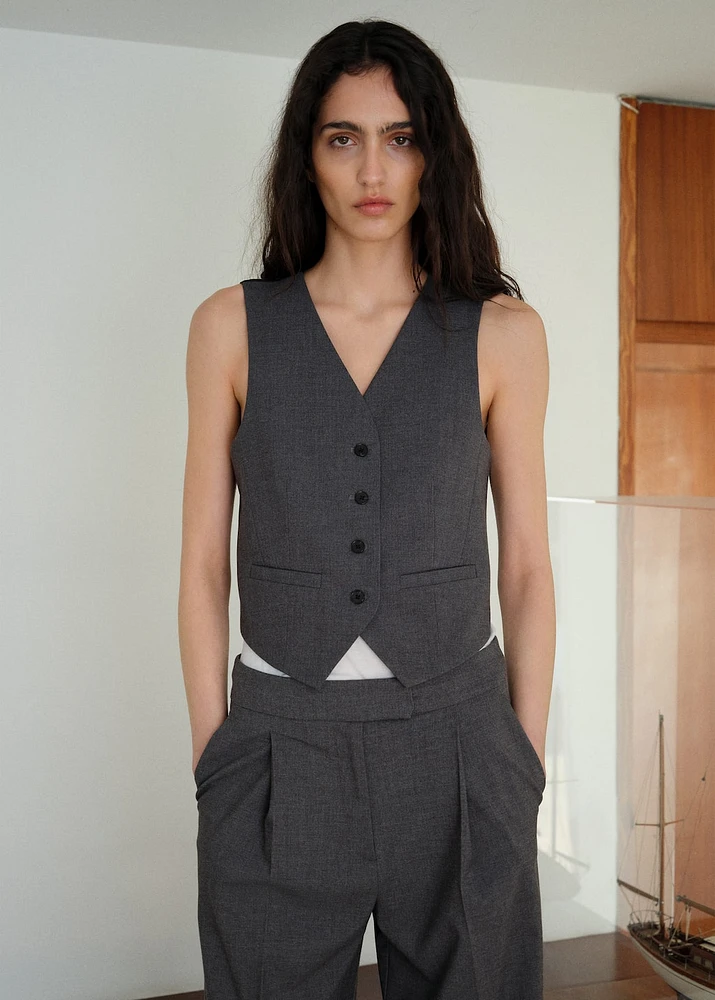 Vest with adjustable belt