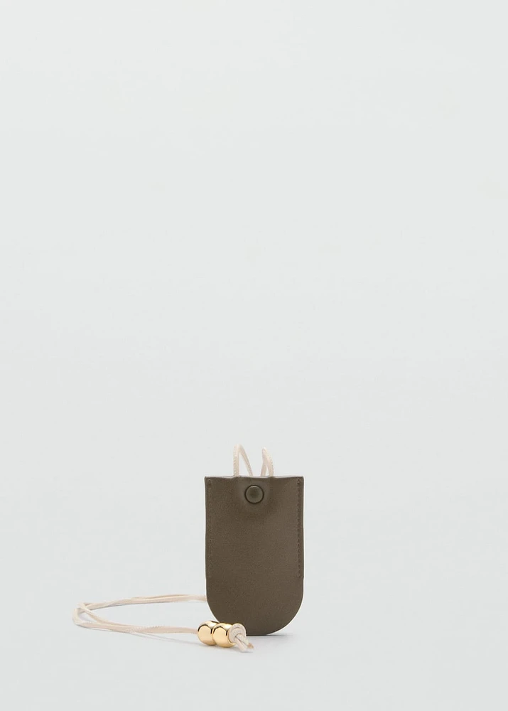 Leather-effect keychain with ball detail