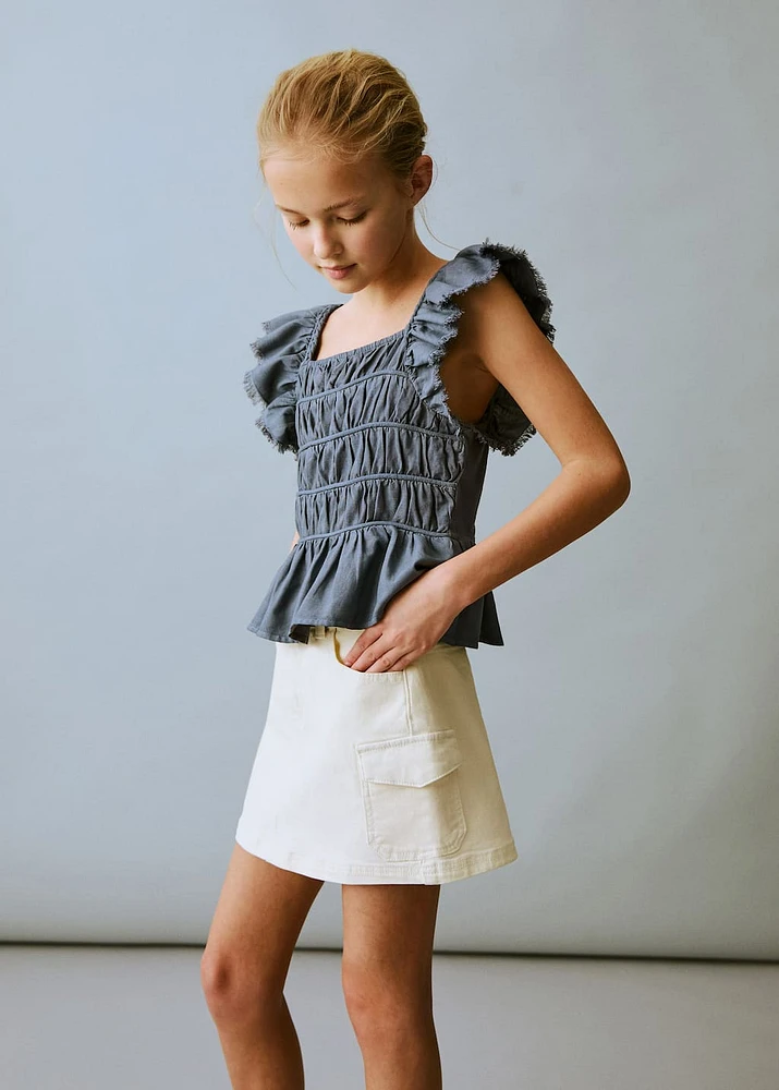 Ruched blouse with ruffles