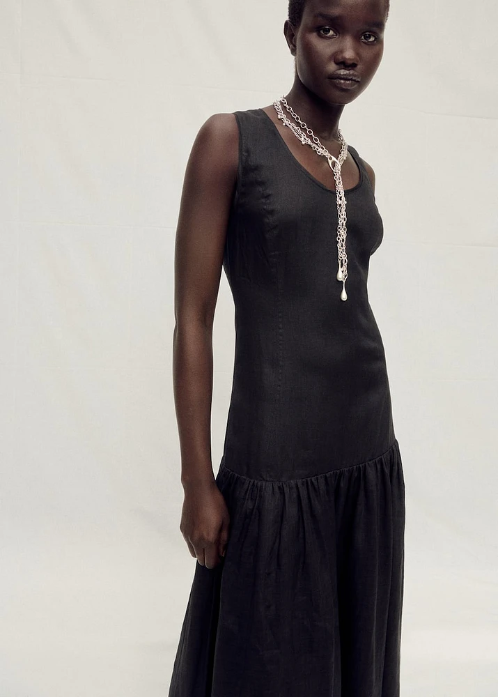 Long linen dress with gathered panel