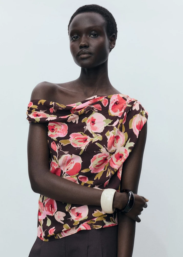 Floral blouse with asymmetrical neck
