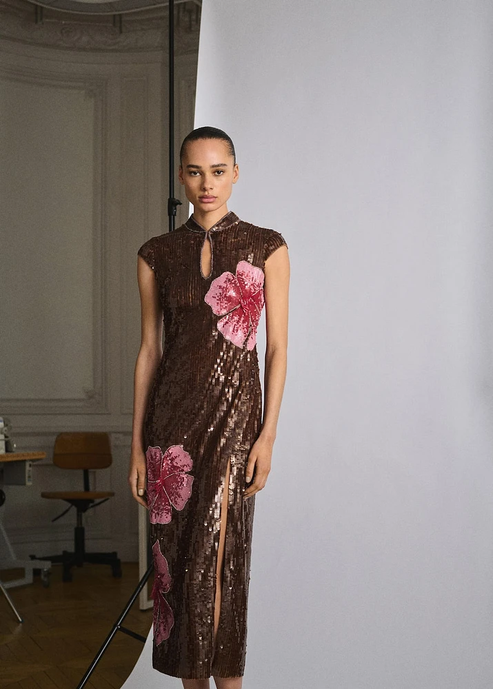 Dress with sequinned flower design