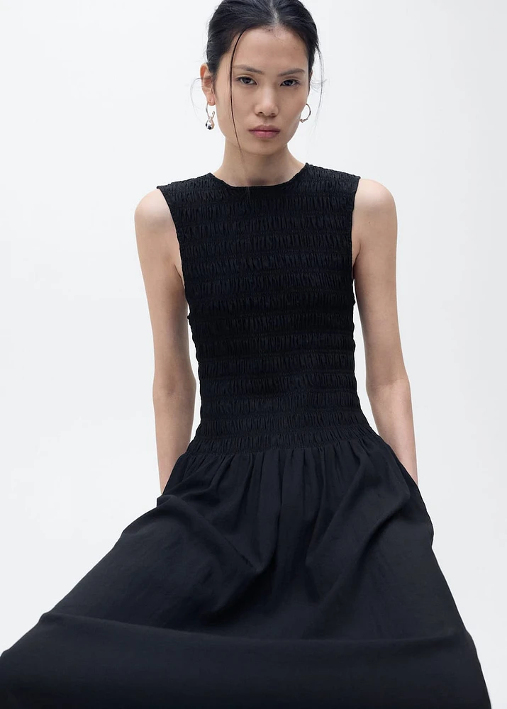 Flared dress with gathered body