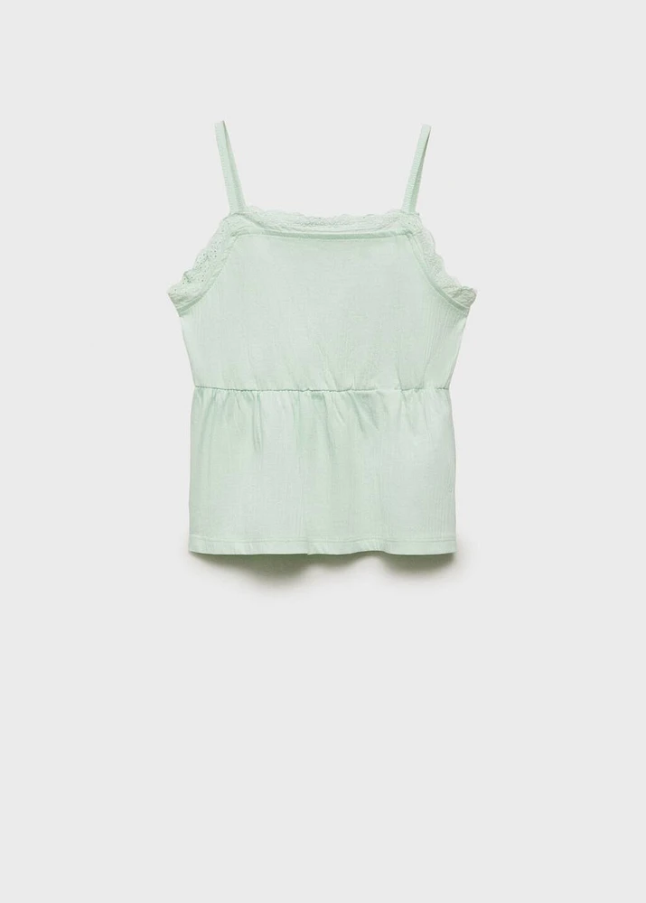 Top with Swiss embroidery detail