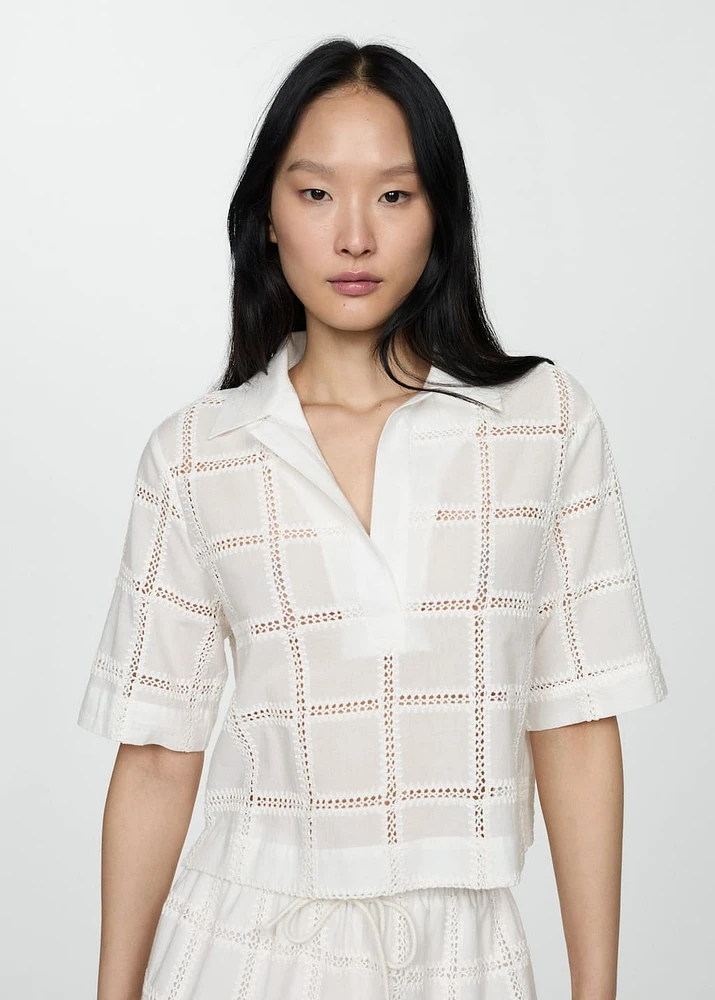 Embroidered polo-neck blouse