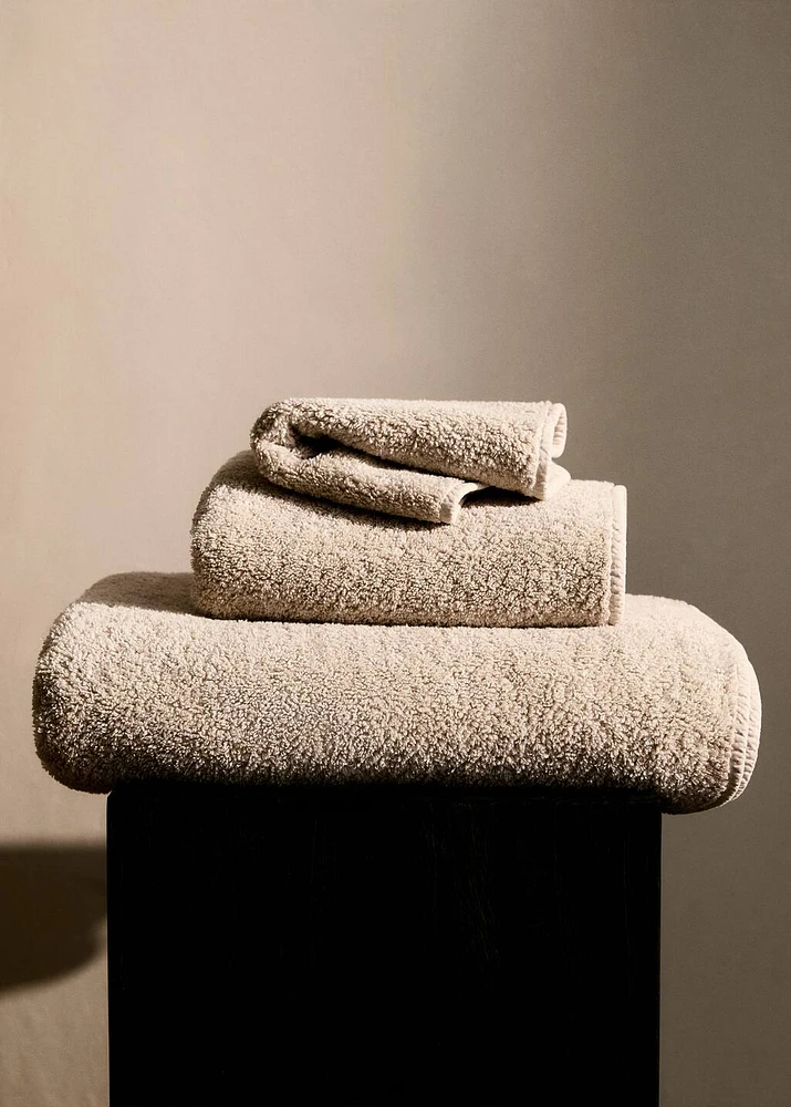 Bath towel with dyed piece