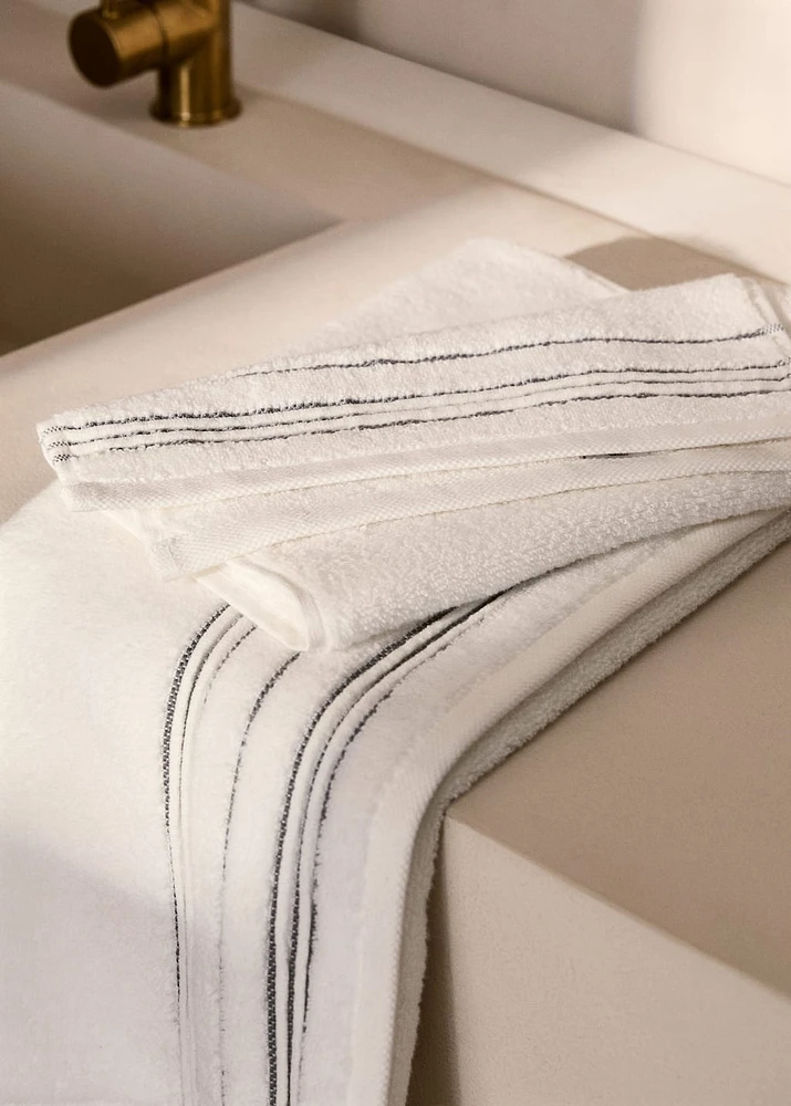 Washbasin towel with striped trim