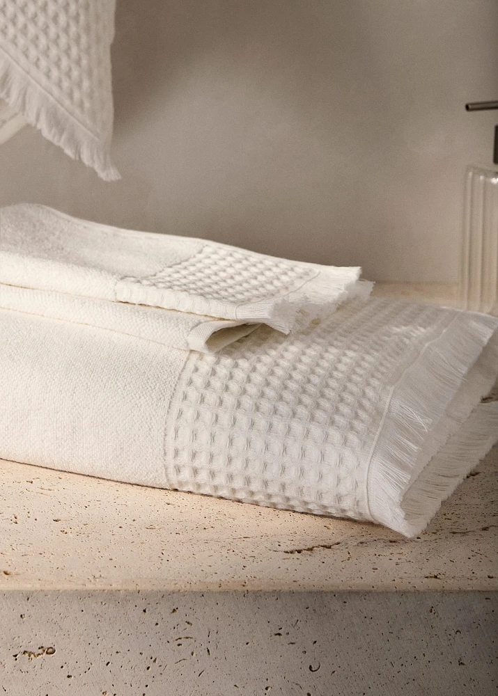 Bath towel with waffle trim and fringe