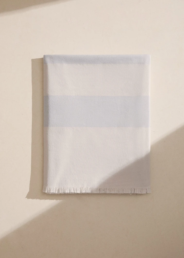 Cotton beach towel with stripes and fringed trim