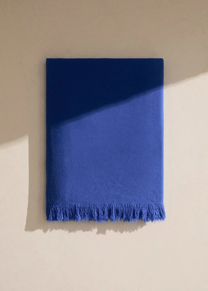 Overdyed terry beach towel with fringes