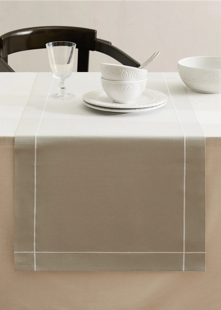 Cotton embroidered table runner with scalloped detail