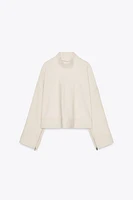TOP VOLUMINEUX À ZIP