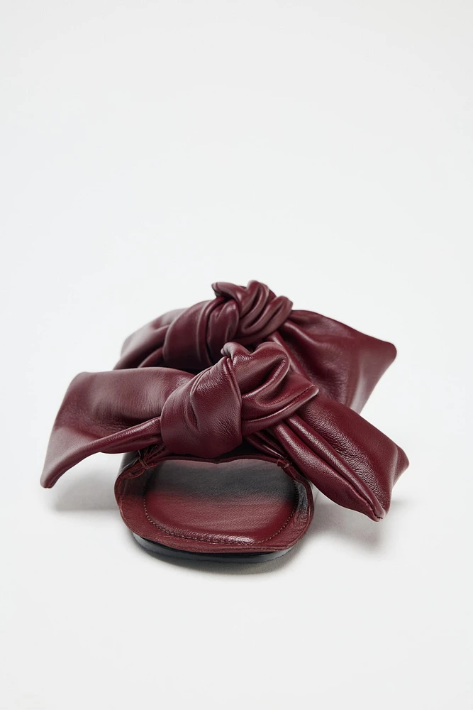 LEATHER BOW SANDALS
