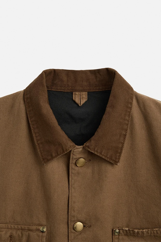 VESTE DÉLAVÉE AVEC COL EN CONTRASTE