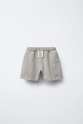 GARMENT DYE EMBROIDERED LOGO BERMUDA SHORTS