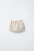 JUPE EN MAILLE AU CROCHET