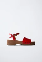 PATENT-FINISH CLOGS