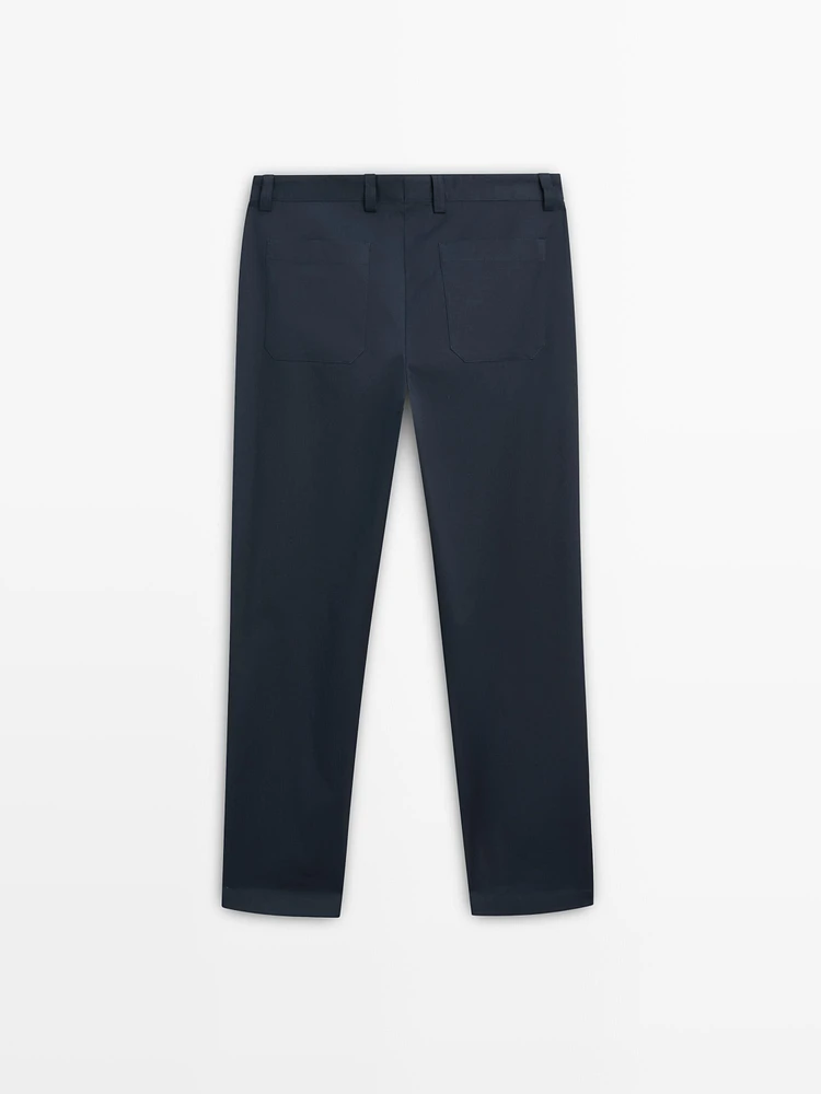 Slim fit cotton blend trousers.