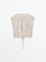 Gathered top with tie fastening