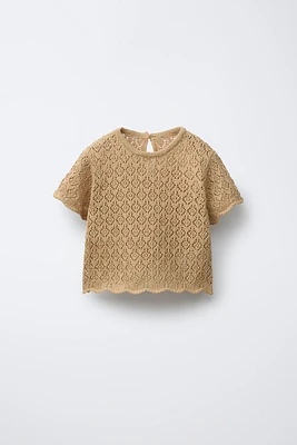 TOP EN MAILLE POINTELLE