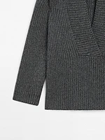 Pull en maille perlée à col effiloché